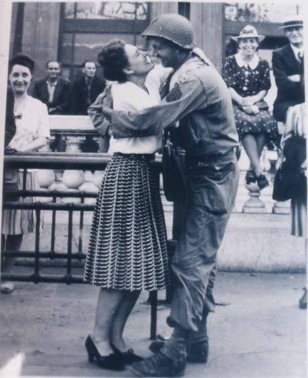 WW2 liberation of Paris aug, 25, 1944, photo from ap newpapers in the us 1944 and US Army paper Yank, 4th ID, 4th Signal, attached to the 12th Army for the liberation of Paris battle of the bulge surrender of germany 1945